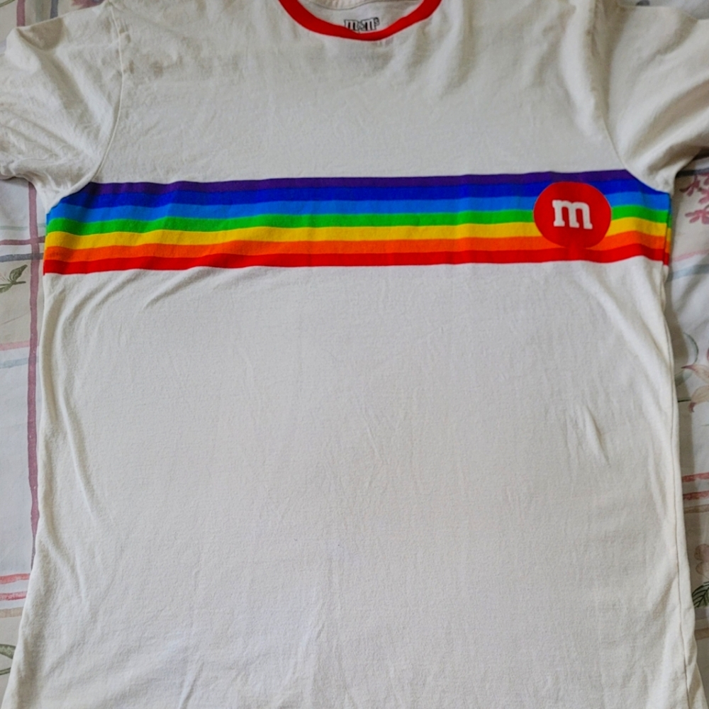 Satisfy your sweet tooth with this simple, yet intriguing M&Ms shirt. Size-large